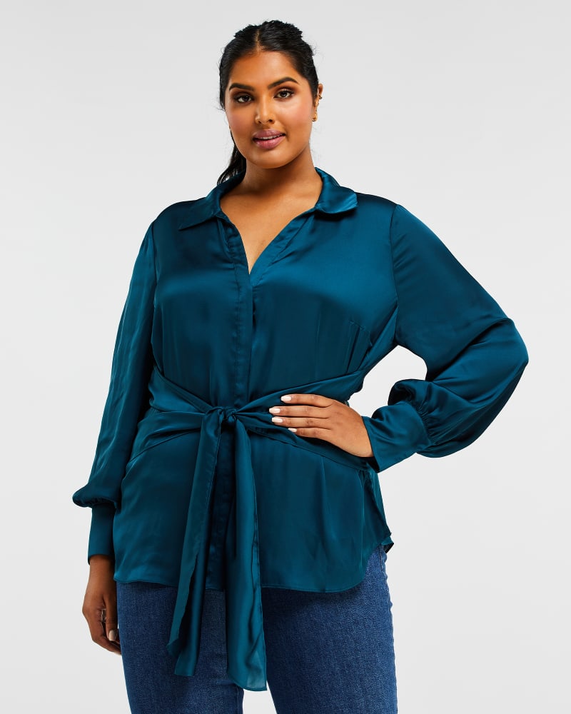 Front of a model wearing a size 1X Ryder Wrap Shirt in Teal by Estelle. | dia_product_style_image_id:235084